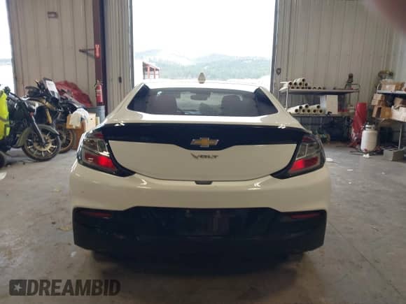2016 Chevrolet Volt Premier z VIN 1G1RD6S55GU129046, wystawiony jako IAAI lot #41990980 z przebiegiem 96 901 mil mil oraz . Historia ofert i sprzedaży dostępna na DreamBid. Obrazek 17.