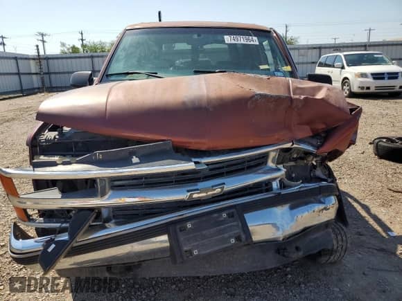 1999 Chevrolet Tahoe Z71 z VIN 1GNEK13R0XJ474557, wystawiony jako Copart lot #74971964 z przebiegiem 217 027 mil mil oraz Szkoda całkowita • Salvage title. Historia ofert i sprzedaży dostępna na DreamBid. Obrazek 5.