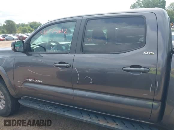 2018 Toyota Tacoma SR5 with VIN 5TFAZ5CN2JX061728, listed as a IAAI auction lot 42775812 with 119,408 mi miles and . Bid and sale history available at DreamBid. Image 14.