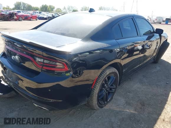 2019 Dodge Charger SXT with VIN 2C3CDXJG6KH743223, listed as a IAAI auction lot 43344866 with 55,661 mi miles and . Bid and sale history available at DreamBid. Image 4.