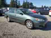 2002 Toyota Camry XLE with VIN JTDBF30K320043468, listed as a Copart auction lot 82289975 with 235,912 mi miles and Salvage title. Bid and sale history available at DreamBid. Image 4.