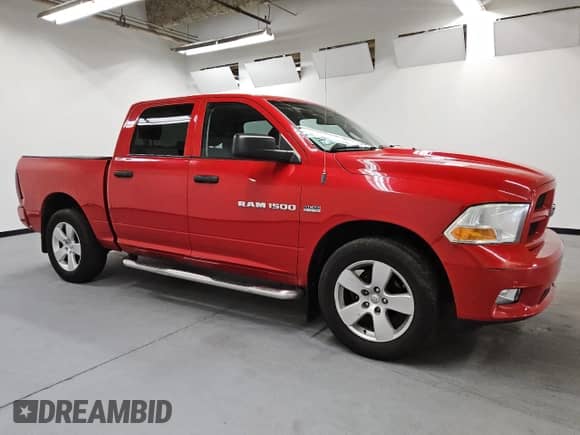 2012 Ram 1500 Express with VIN 1C6RD7KT7CS199737, listed as a Copart auction lot 67787315 with 211,758 mi miles and Clean title. Bid and sale history available at DreamBid. Image 4.