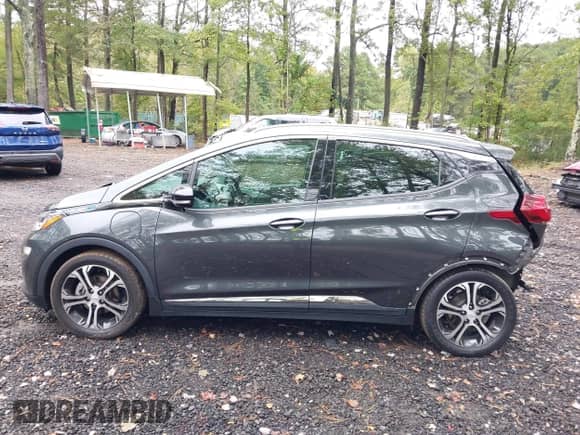 2020 Chevrolet Bolt EV Premier with VIN 1G1FZ6S03L4119523, listed as a IAAI auction lot 43437661 with 69,936 mi miles and . Bid and sale history available at DreamBid. Image 14.