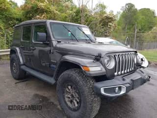 2021 Jeep Wrangler Unlimited Sahara with VIN 1C4JJXP60MW704738, listed as a IAAI auction lot 42042079 with 63,765 mi miles and . Bid and sale history available at DreamBid. Image 1.