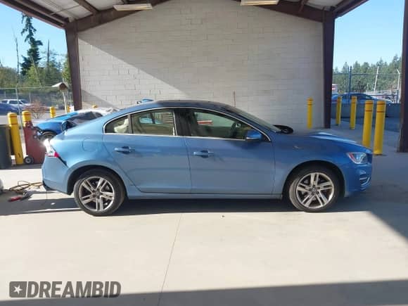 2015 Volvo S60 T5 Drive-E Premier with VIN YV126MFB2F1313006, listed as a IAAI auction lot 42654814 with Not provided miles and . Bid and sale history available at DreamBid. Image 12.