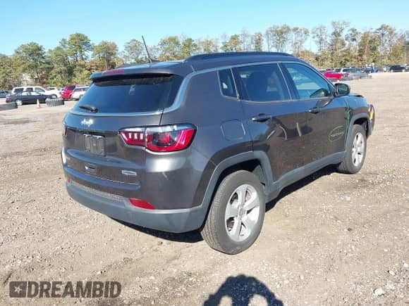 2021 Jeep Compass Latitude with VIN 3C4NJDBB1MT537509, listed as a IAAI auction lot 43492361 with 42,384 mi miles and . Bid and sale history available at DreamBid. Image 4.