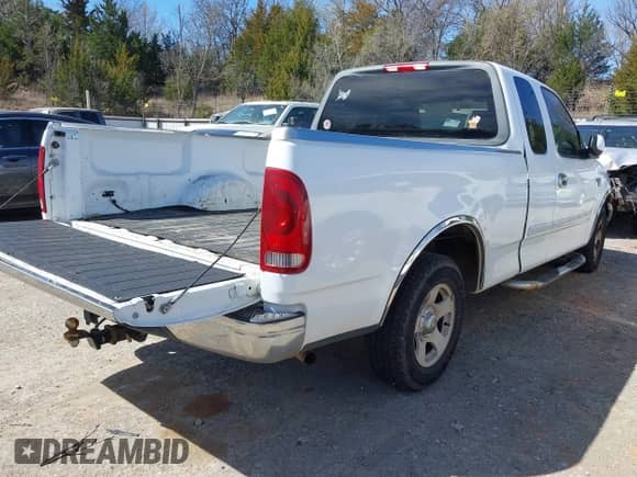 2003 Ford F-150 XL with VIN 1FTRX17W03NA37401, listed as a IAAI auction lot 41724466 with 350,336 mi miles and . Bid and sale history available at DreamBid. Image 4.