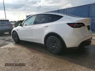 2023 Tesla Model Y Long Range with VIN 7SAYGAEE4PF863973, listed as a Copart auction lot 67838404 with 25,165 mi miles and Salvage title. Bid and sale history available at DreamBid. Image 2.