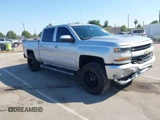 2018 Chevrolet Silverado 1500 LT with VIN 3GCUKREC7JG636172, listed as a IAAI auction lot 42461414 with 43,685 mi miles and . Bid and sale history available at DreamBid. Image 1.