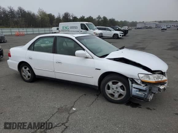 1999 Honda Accord EX with VIN 1HGCG6672XA059315, listed as a Copart auction lot 66391805 with 143,937 mi miles and Non repairable. Bid and sale history available at DreamBid. Image 4.