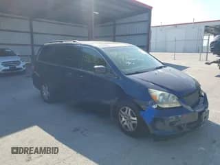 2007 Honda Odyssey EX-L z VIN 5FNRL38707B051706, wystawiony jako IAAI lot #43365185 z przebiegiem 246 343 mil mil oraz . Historia ofert i sprzedaży dostępna na DreamBid. Obrazek 1.