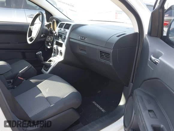 2009 Dodge Caliber SXT with VIN 1B3HB48C29D181709, listed as a IAAI auction lot 41425090 with 147,557 mi miles and . Bid and sale history available at DreamBid. Image 5.