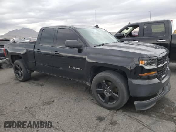 2016 Chevrolet Silverado 1500 Work Truck with VIN 1GCRCNEH0GZ368808, listed as a Copart auction lot 55701715 with 112,444 mi miles and Salvage title. Bid and sale history available at DreamBid. Image 4.