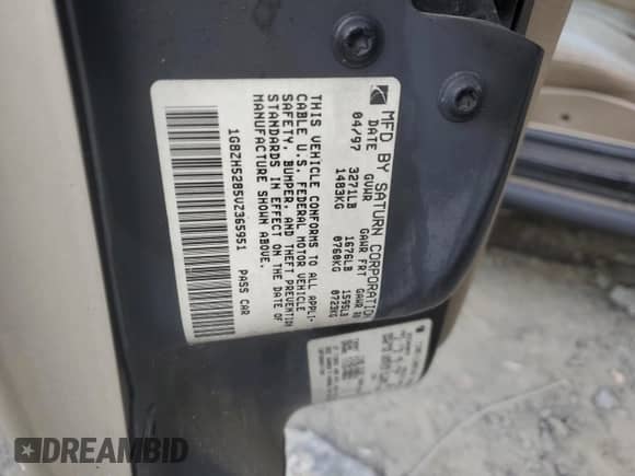 1997 Saturn SL с VIN 1G8ZH5285VZ365951, выставлен на аукционе Copart как лот 70902264 с пробегом 104 781 миль миль и Списание • Salvage title. История ставок и продаж доступна на DreamBid. Изображение 14.