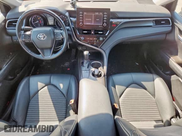 2023 Toyota Camry SE z VIN 4T1G11AK1PU099878, wystawiony jako Copart lot #81935255 z przebiegiem 59 629 mil mil oraz Szkoda całkowita • Salvage title. Historia ofert i sprzedaży dostępna na DreamBid. Obrazek 8.