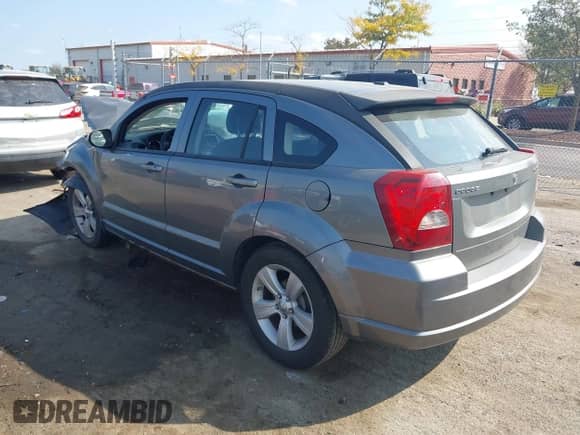 2011 Dodge Caliber Mainstreet z VIN 1B3CB3HA4BD268794, wystawiony jako IAAI lot #43266104 z przebiegiem 159 868 mil mil oraz . Historia ofert i sprzedaży dostępna na DreamBid. Obrazek 3.