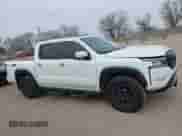 2023 Nissan Frontier SV z VIN 1N6ED1EK9PN615067, wystawiony jako IAAI lot #41554561 z przebiegiem 23 529 mil mil oraz . Historia ofert i sprzedaży dostępna na DreamBid. Obrazek 14.