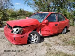 2005 Hyundai Accent GLS с VIN KMHCG45CX5U618473, выставлен на аукционе Copart как лот 76752994 с пробегом Не указан миль и Списание • Salvage title. История ставок и продаж доступна на DreamBid. Изображение 1.