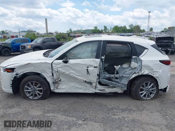 2024 Mazda CX-5 S Preferred z VIN JM3KFBCM7R0364230, wystawiony jako IAAI lot #41859044 z przebiegiem 13 899 mil mil oraz . Historia ofert i sprzedaży dostępna na DreamBid. Obrazek 15.