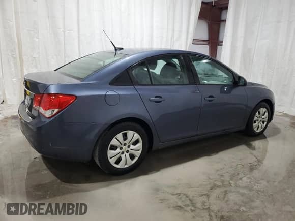 2013 Chevrolet Cruze LS с VIN 1G1PA5SG5D7170251, выставлен на аукционе Copart как лот 70532395 с пробегом 118 205 миль миль и Списание • Salvage title. История ставок и продаж доступна на DreamBid. Изображение 3.