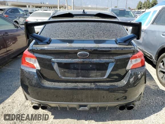 2016 Subaru WRX Limited z VIN JF1VA1L65G9810633, wystawiony jako Copart lot #69771315 z przebiegiem 113 884 mil mil oraz Szkoda całkowita • Salvage title. Historia ofert i sprzedaży dostępna na DreamBid. Obrazek 6.