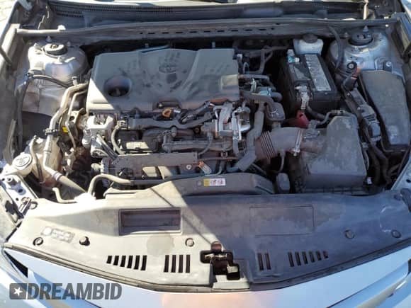 2020 Toyota Camry LE z VIN 4T1C11AK8LU351957, wystawiony jako Copart lot #86512345 z przebiegiem 83 646 mil mil oraz Szkoda całkowita • Salvage title. Historia ofert i sprzedaży dostępna na DreamBid. Obrazek 11.