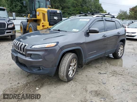 2014 Jeep Cherokee Latitude with VIN 1C4PJMCS2EW318416, listed as a Copart auction lot 80883195 with 201,236 mi miles and Clean title. Bid and sale history available at DreamBid. Image 1.