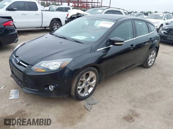 2014 Ford Focus Titanium with VIN 1FADP3N2XEL451800, listed as a IAAI auction lot 43103609 with 215,961 mi miles and . Bid and sale history available at DreamBid. Image 2.