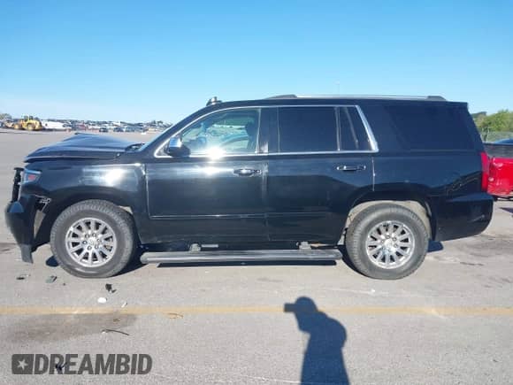 2015 Chevrolet Tahoe LTZ с VIN 1GNSKCKC7FR599535, выставлен на аукционе IAAI как лот 43062759 с пробегом 165 554 миль миль и . История ставок и продаж доступна на DreamBid. Изображение 14.