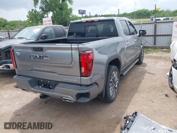 2024 GMC Sierra 1500 Denali Ultimate with VIN 1GTUUHEL6RZ148864, listed as a IAAI auction lot 42125355 with Not provided miles and . Bid and sale history available at DreamBid. Image 4.