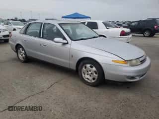 2002 Saturn LS with VIN 1G8JW54R32Y517171, listed as a Copart auction lot 74849884 with Not provided miles and Salvage title. Bid and sale history available at DreamBid. Image 4.