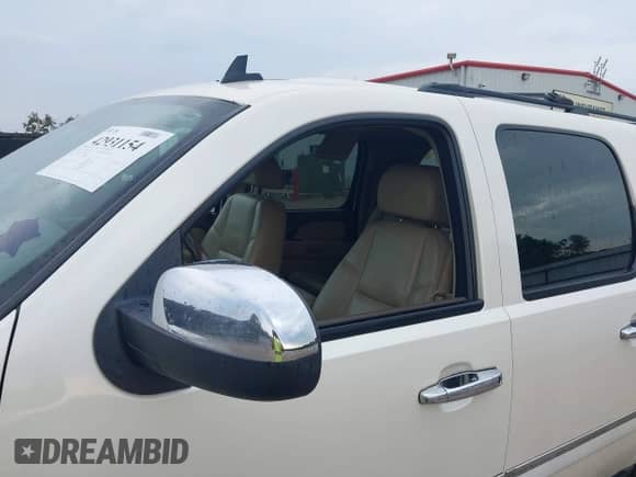 2009 Chevrolet Suburban LTZ z VIN 1GNFC360X9R170151, wystawiony jako IAAI lot #42931154 z przebiegiem 211 047 mil mil oraz . Historia ofert i sprzedaży dostępna na DreamBid. Obrazek 6.