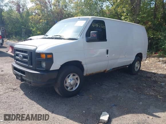 2013 Ford Econoline Cargo Commercial with VIN 1FTNE1EW6DDA59143, listed as a IAAI auction lot 42942320 with 175,562 mi miles and . Bid and sale history available at DreamBid. Image 2.