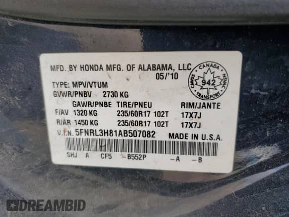 2010 Honda Odyssey with VIN 5FNRL3H81AB507082, listed as a Copart auction lot 62931535 with 328,109 mi miles and Salvage title. Bid and sale history available at DreamBid. Image 14.