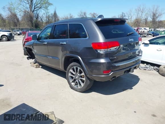 2017 Jeep Grand Cherokee Overland with VIN 1C4RJFCG0HC602990, listed as a IAAI auction lot 41998539 with 170,640 mi miles and . Bid and sale history available at DreamBid. Image 3.