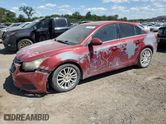 2011 Chevrolet Cruze ECO 1XF z VIN 1G1PJ5S96B7223912, wystawiony jako Copart lot #70115825 z przebiegiem 192 058 mil mil oraz Szkoda całkowita • Salvage title. Historia ofert i sprzedaży dostępna na DreamBid. Obrazek 1.