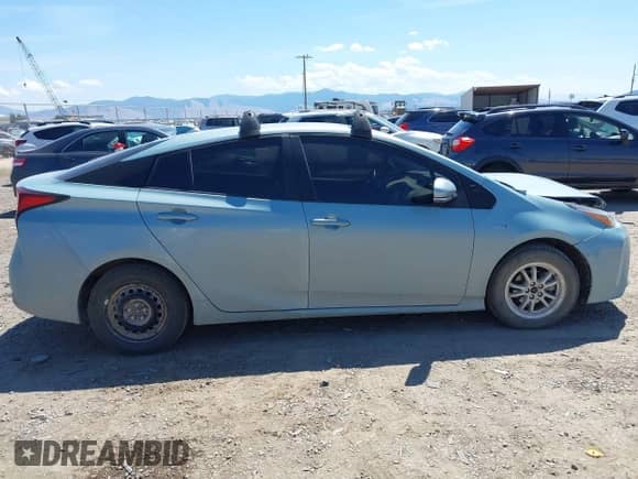2021 Toyota Prius LE with VIN JTDL9MFU9M3023818, listed as a IAAI auction lot 42842899 with 99,876 mi miles and . Bid and sale history available at DreamBid. Image 13.