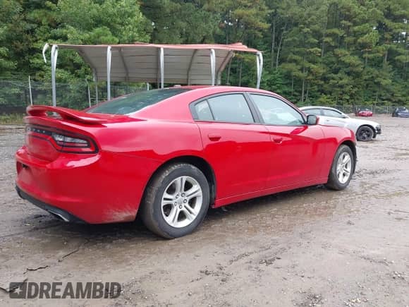 2015 Dodge Charger SE with VIN 2C3CDXBG5FH812391, listed as a IAAI auction lot 43196303 with 99,372 mi miles and . Bid and sale history available at DreamBid. Image 4.