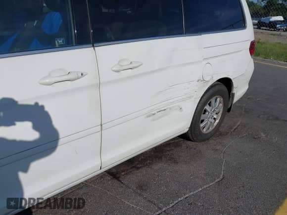 2008 Honda Odyssey EX-L with VIN 5FNRL38628B409087, listed as a IAAI auction lot 42974388 with 260,888 mi miles and . Bid and sale history available at DreamBid. Image 6.