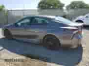 2023 Toyota Camry Hybrid XSE с VIN 4T1K31AK2PU601303, выставлен на аукционе Copart как лот 81736455 с пробегом 23 901 миль миль и Списание • Salvage title. История ставок и продаж доступна на DreamBid. Изображение 2.