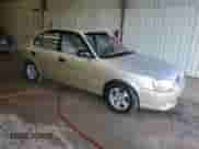 2002 Hyundai Accent GL z VIN KMHCG45C32U373009, wystawiony jako Copart lot #62753865 z przebiegiem Nie podano mil oraz Szkoda całkowita • Salvage title. Historia ofert i sprzedaży dostępna na DreamBid. Obrazek 4.