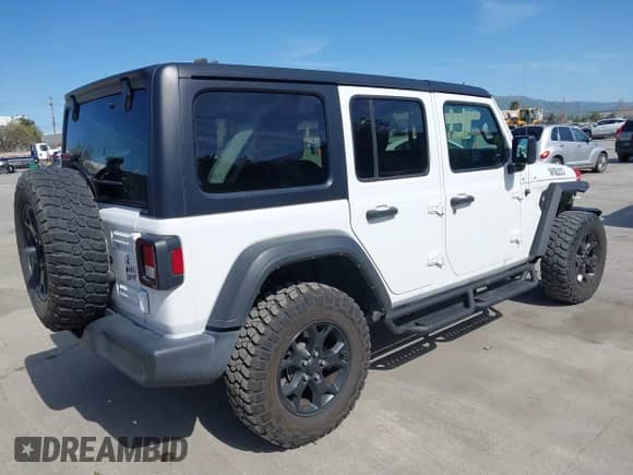 2022 Jeep Wrangler Unlimited Sport S with VIN 1C4HJXDG7NW144634, listed as a IAAI auction lot 41975242 with 29,336 mi miles and . Bid and sale history available at DreamBid. Image 4.