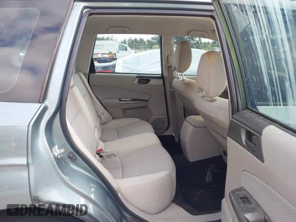 2011 Subaru Forester X with VIN JF2SHBBC8BH724058, listed as a IAAI auction lot 43547335 with 183,923 mi miles and . Bid and sale history available at DreamBid. Image 8.