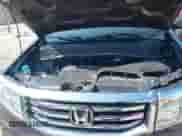 2013 Honda Pilot EX-L with VIN 5FNYF4H57DB082731, listed as a IAAI auction lot 43203205 with 96,017 mi miles and . Bid and sale history available at DreamBid. Image 10.