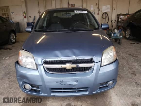 2007 Chevrolet Aveo LS z VIN KL1TD56697B119021, wystawiony jako Copart lot #67127784 z przebiegiem 178 885 mil mil oraz Szkoda całkowita • Salvage title. Historia ofert i sprzedaży dostępna na DreamBid. Obrazek 5.