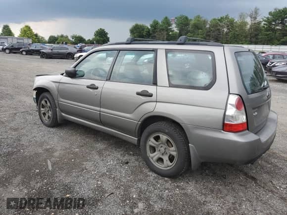 2006 Subaru Forester X with VIN JF1SG63626H727082, listed as a Copart auction lot 62727425 with 113,434 mi miles and Salvage title. Bid and sale history available at DreamBid. Image 2.