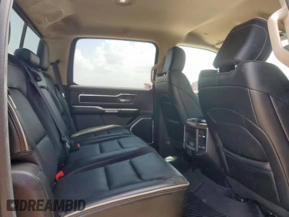 2021 Ram 1500 Laramie z VIN 1C6RREJT4MN711574, wystawiony jako Copart lot #61035445 z przebiegiem 99 486 mil mil oraz Szkoda całkowita • Salvage title. Historia ofert i sprzedaży dostępna na DreamBid. Obrazek 10.