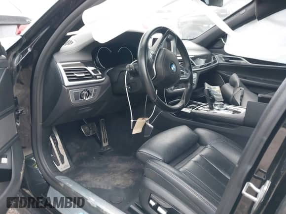 2019 BMW 7 Series 740i with VIN WBA7E2C59KB217750, listed as a IAAI auction lot 42915951 with 95,148 mi miles and . Bid and sale history available at DreamBid. Image 5.
