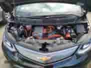 2017 Chevrolet Bolt EV Premier z VIN 1G1FX6S03H4191173, wystawiony jako Copart lot #66540943 z przebiegiem 66 507 mil mil oraz . Historia ofert i sprzedaży dostępna na DreamBid. Obrazek 11.