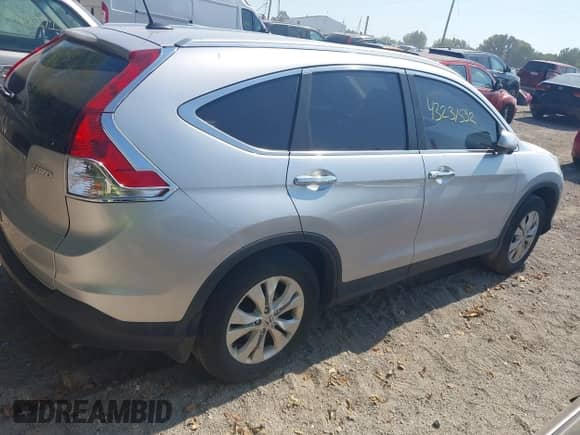 2014 Honda CR-V EX-L with VIN 5J6RM4H79EL081178, listed as a IAAI auction lot 43231532 with 165,589 mi miles and . Bid and sale history available at DreamBid. Image 13.